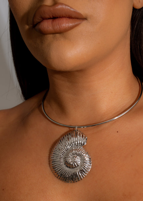 A stunning silver choker necklace featuring a Caribbean Sea-inspired design