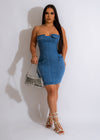 Stylish woman wearing a Making A Decision Denim Mini Dress in a casual setting, accentuating her figure and exuding confidence 