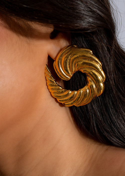 Shiny gold little croissant earrings, a delightful accessory for any outfit
