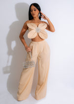 Alt text: A stylish and trendy nude rhinestone pant set, perfect for any fashion-forward individual looking to make a statement with their outfit