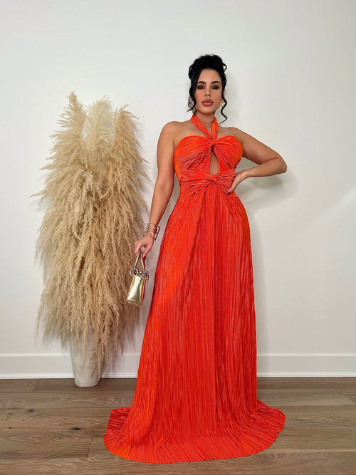 Beautiful and luxurious long orange silk dress with shimmering effect