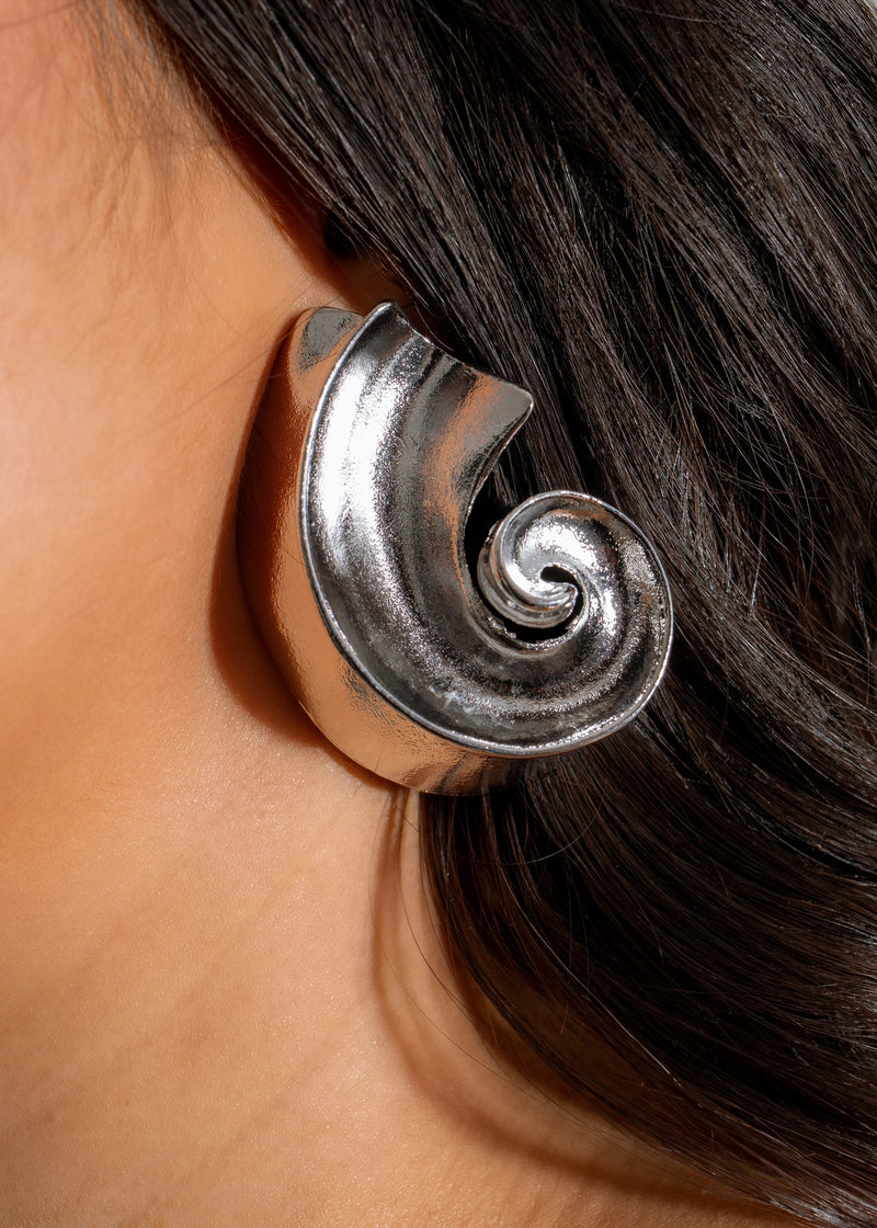 Beautiful sterling silver Nautilus earring, featuring intricate shell design and elegant craftsmanship