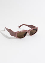 Stylish oval sunglasses in a vibrant pink hue, perfect for summer