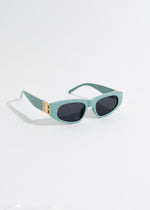Keep Watching Oval Sunglasses Green in vibrant emerald green with UV protection