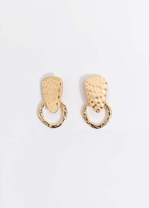Pair of handcrafted gold hoop earrings with antique charm and intricate details
