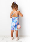Whimsical and charming kids romper featuring seashells, starfish, and mermaid scales