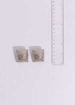  Elegant silver earrings featuring a stunning cityscape motif, ideal for a night out in the city
