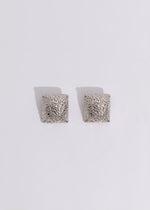 Dazzling silver earrings with intricate city skyline design, perfect for evening events
