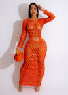 Orange crochet cover up featuring mother of pearl detailing for beachwear