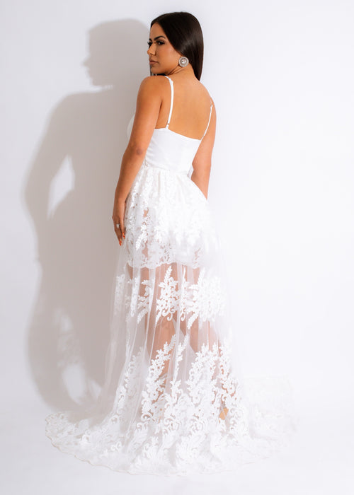  Gorgeous mystery lace maxi dress in classic white, featuring intricate lace patterns and a flowing, floor-length design