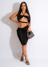 Black skirt set with a matching top that offers a stylish and sophisticated look