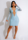 A stunning blue mini dress adorned with sparkling rhinestones, perfect for a night out