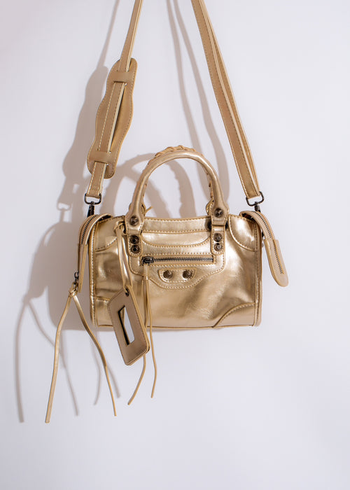 Girl Code Handbag Gold, a stylish and elegant accessory for any outfit