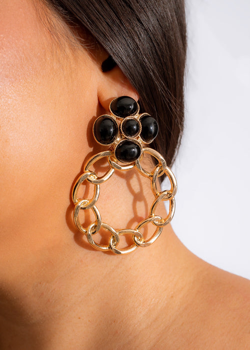 Handcrafted black earring with intricate design, perfect to stay with you all day