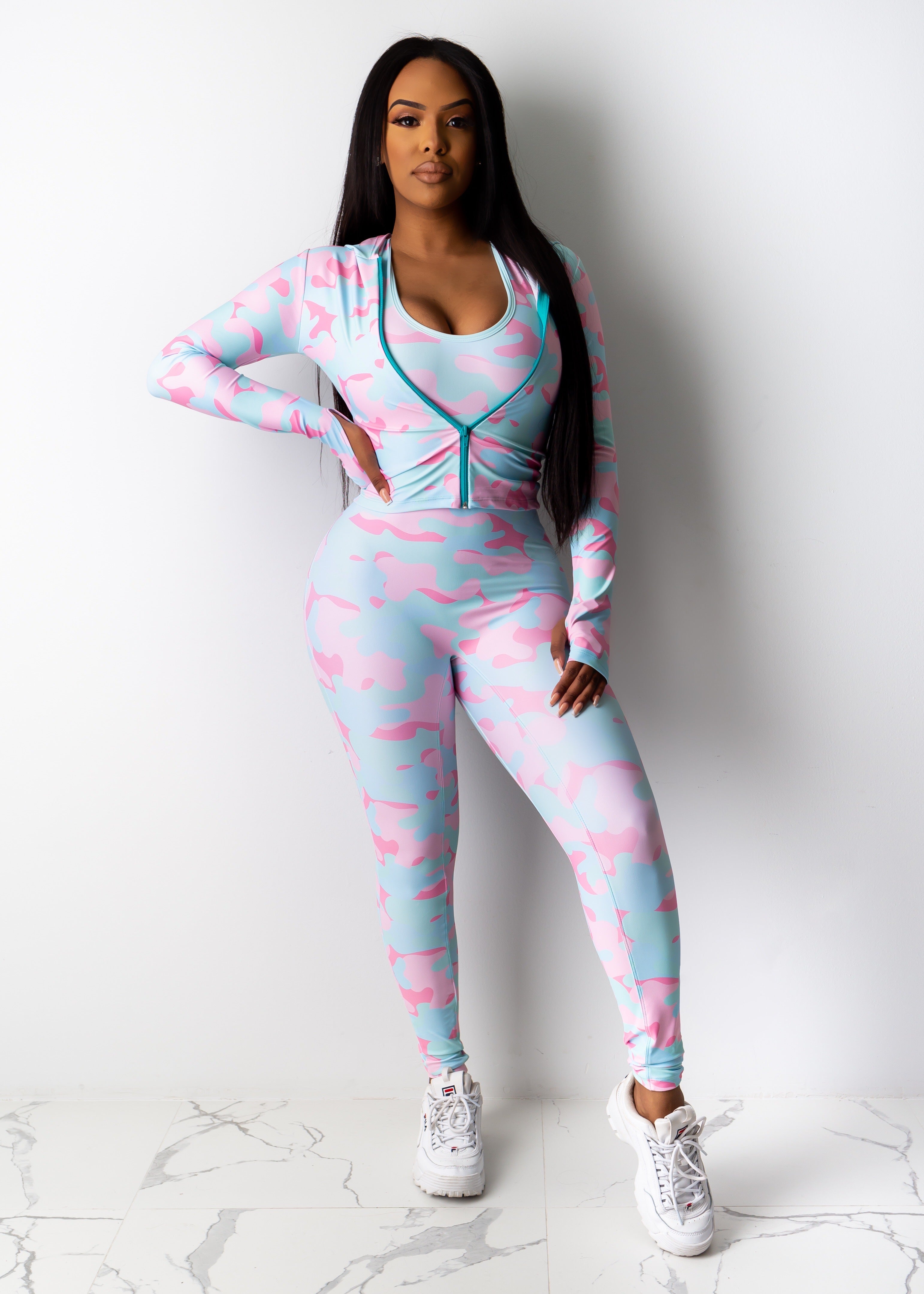 Mind On A Mission Camo Jacket in green and brown camouflage pattern with multiple pockets and adjustable drawstring waist for a versatile and stylish outerwear option