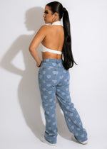  Vintage-inspired mom jeans with heart appliques and raw hem