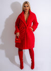 Stylish and cozy red urban faux fur coat with a luxurious texture and warm lining for a fashionable winter look