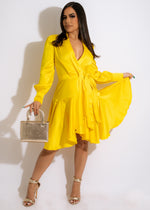 Beautiful yellow mini dress with floral pattern, perfect for summer events and parties
