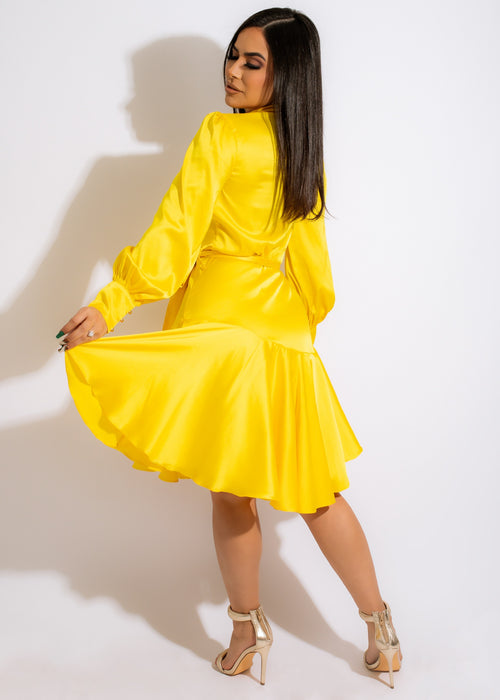  Stylish and vibrant yellow mini dress with adjustable spaghetti straps and a flattering silhouette