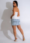 Stylish and trendy white mini dress with a unique bandage design and V-neckline
