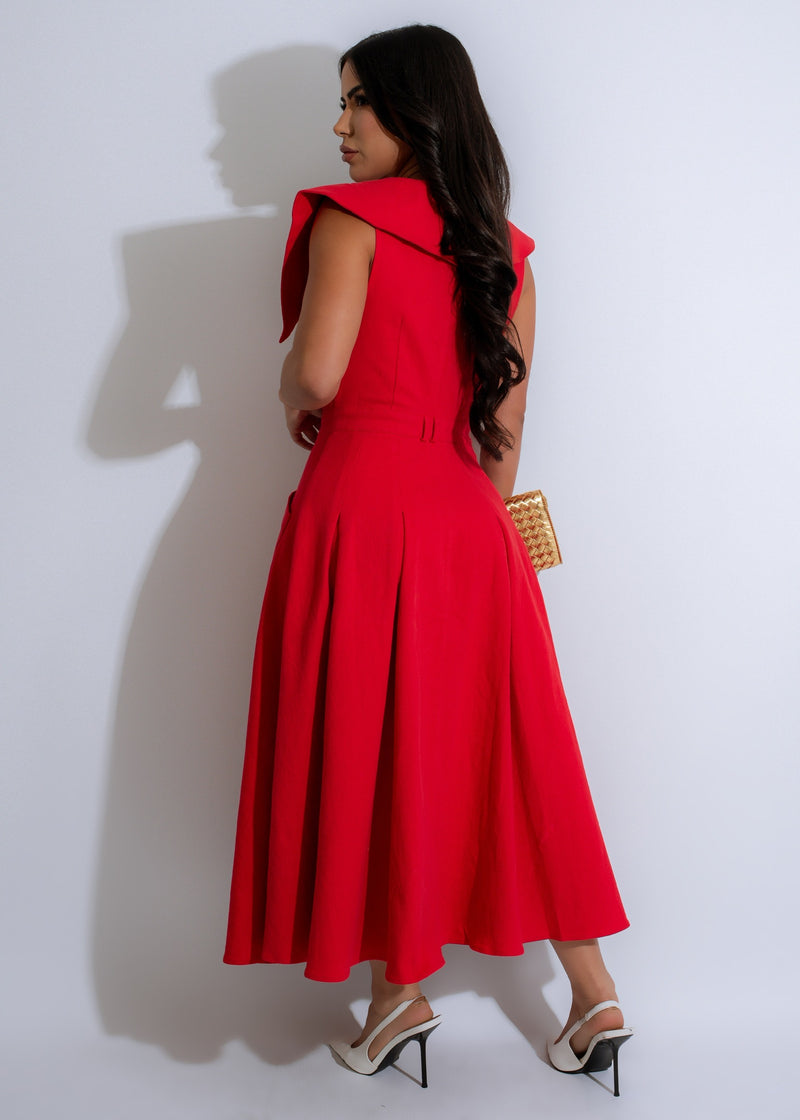 This red midi dress features a fitted silhouette, a V-neckline, and a striking fire-inspired print, making it a stand-out choice for any fashion-forward individual