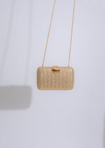 Seashell weave clutch in gold with intricate handcrafted detailing