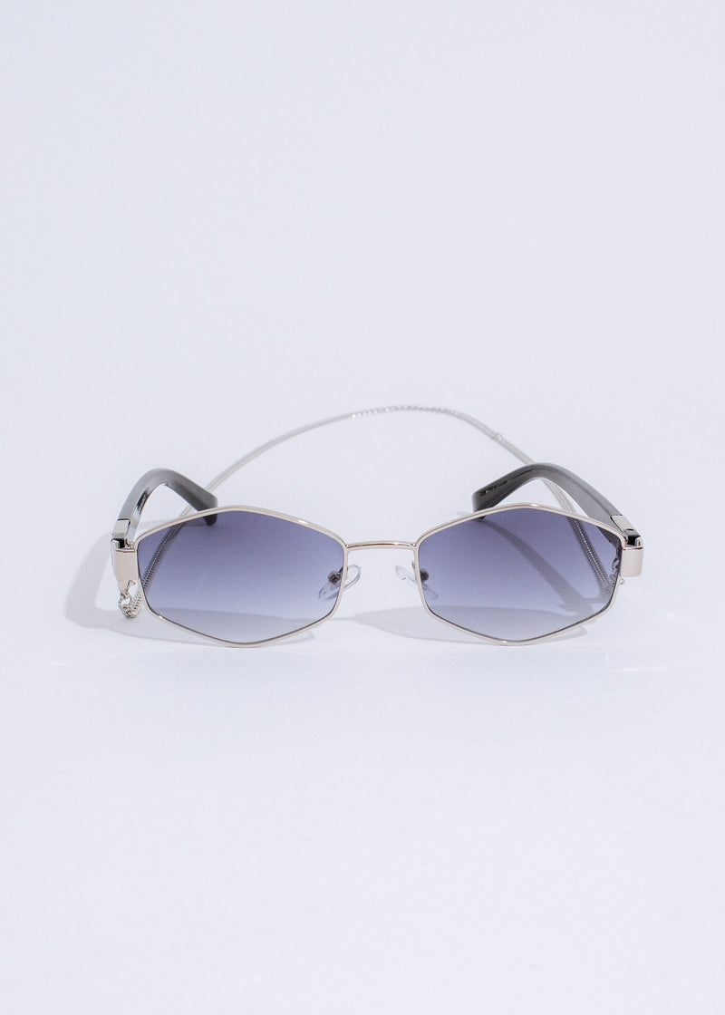 Silver sunglasses with reflective lenses and elegant frame for a stylish look