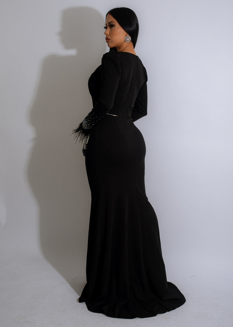 Sleek and sophisticated maxi dress with eye-catching rhinestone embellishments