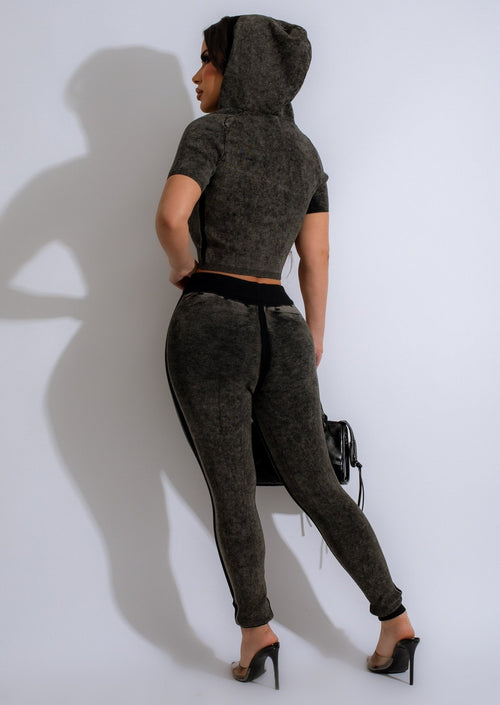 Stay stylish and cozy in the I'm Capricious Knit Jogger Set Black, featuring a chic black knit sweater and coordinating jogger pants with a drawstring waist and ribbed cuffs