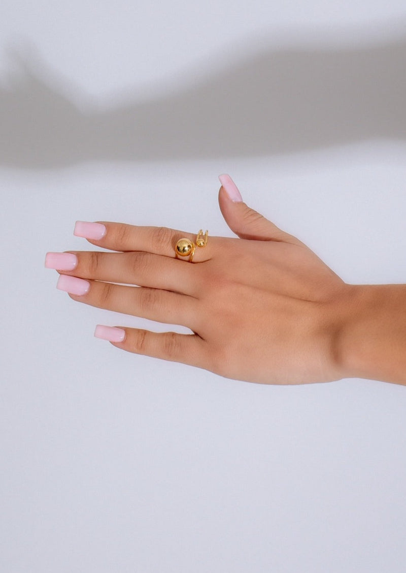 Beautiful gold ring featuring a lovely girl design, perfect for any stylish woman