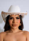 Fashionable white cowboy hat adorned with sparkling butterfly rhinestones for a stylish look