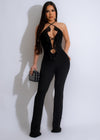 Sleek black mesh jumpsuit with a flattering silhouette and trendy design