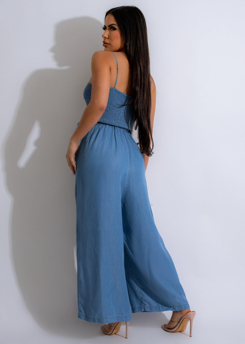 Fashionable boho jumpsuit in a vibrant shade of blue with unique design details