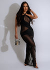 Beautiful woman wearing a black Total Sexy Mesh Ruched Maxi Dress with elegant ruched design and mesh fabric, perfect for a night out or special occasion
