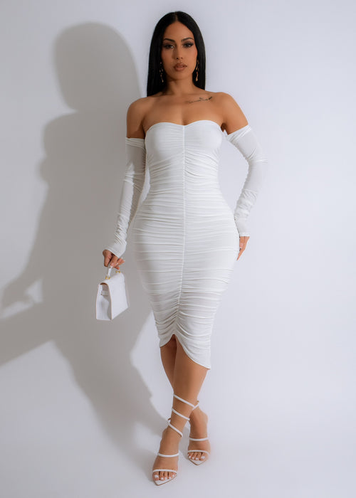 A beautiful and elegant white ruched midi dress with a vibrant charm