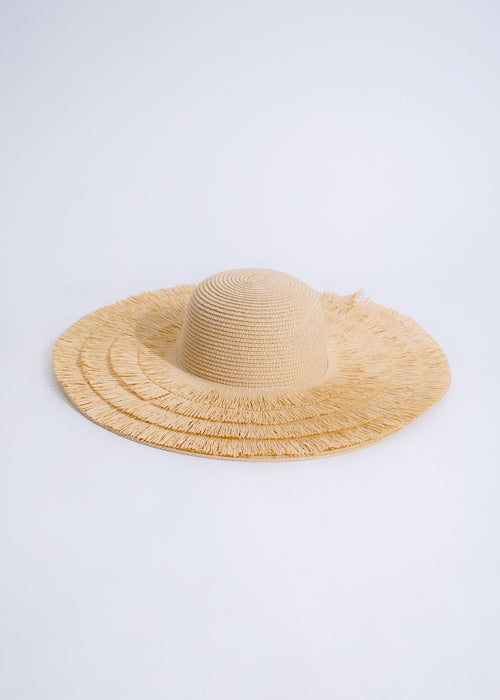 Beige wide-brimmed floppy sun hat with ribbon detail, perfect for vacation