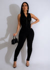 Beautiful black ruched jumpsuit with mesh detailing, perfect for any occasion