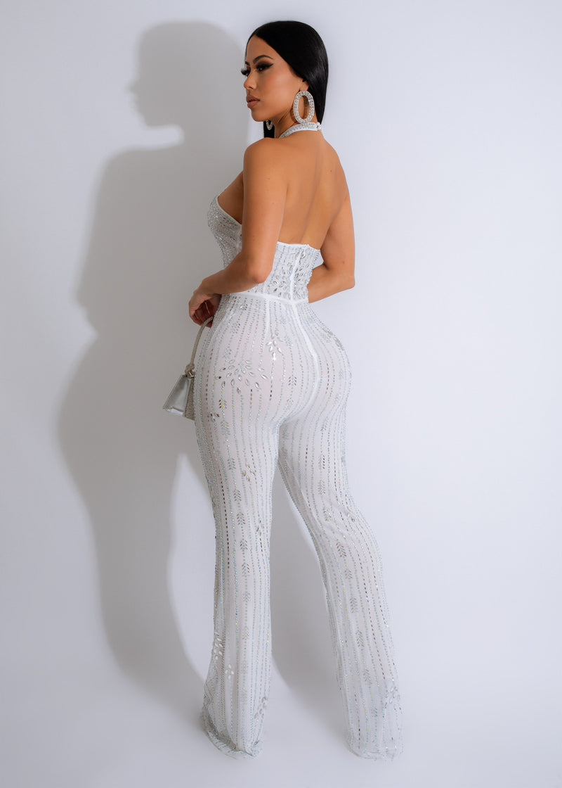 A stunning white jumpsuit with mesh and diamond detailing for fireworks