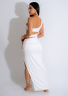 White ruched maxi dress with a flowing silhouette and elegant design