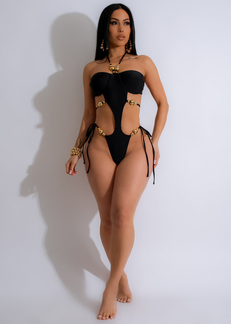 Stylish and comfortable black one-piece swimsuit for summer vacation 