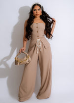 Fashion-forward brown pant set featuring a stylish, tailored design with coordinating top 