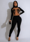Vinyl record mesh pearls jumpsuit black with plunging neckline and wide leg pants