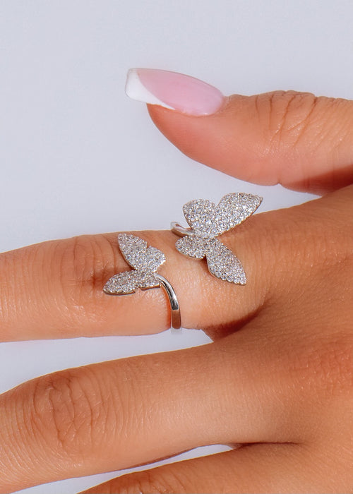 I Feel Butterflies Ring Silver on woman's hand with delicate details
