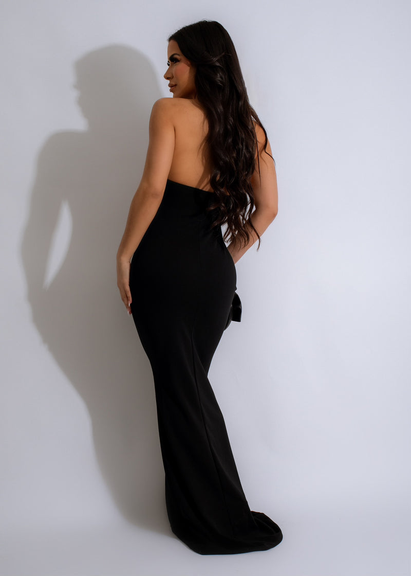 An elegant and timeless black maxi dress with a flattering silhouette
