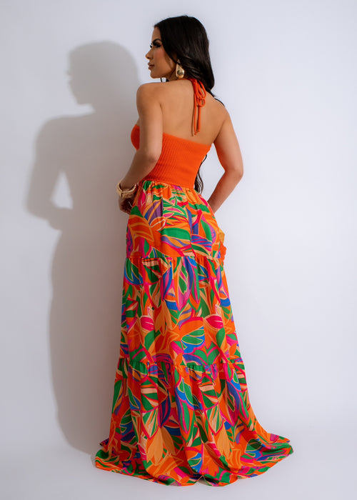Stunning summer dress in vibrant orange with crochet detailing and flowy maxi length