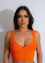 Love Hurts Ribbed Crop Top in vibrant orange with stylish ribbed texture
