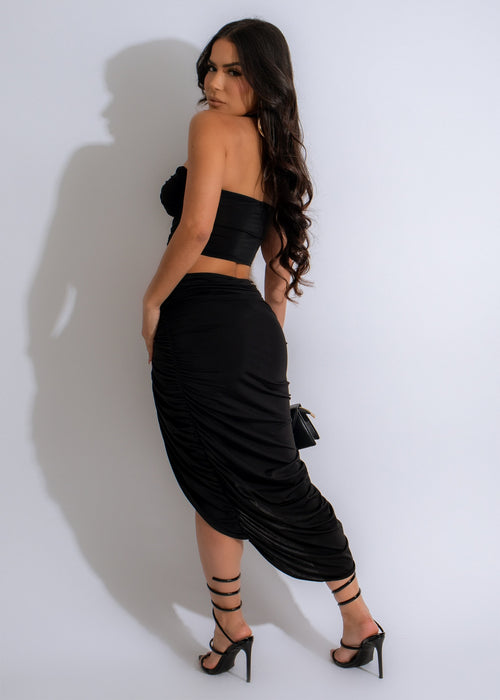 Black ruched skirt set with matching top, perfect for date night