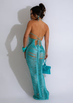 Saharan Sunset Maxi Dress Blue, a stunning, breathable garment with a vibrant, eye-catching design