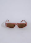 Stylish pink oval sunglasses with UV protection and polarized lenses 