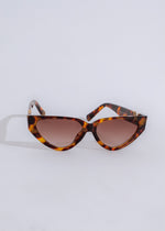 Close-up of stylish oval brown Only Me sunglasses with UV protection 